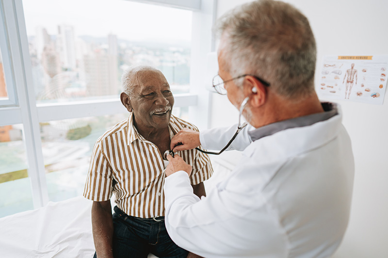 Doctor listening to a patient's heart