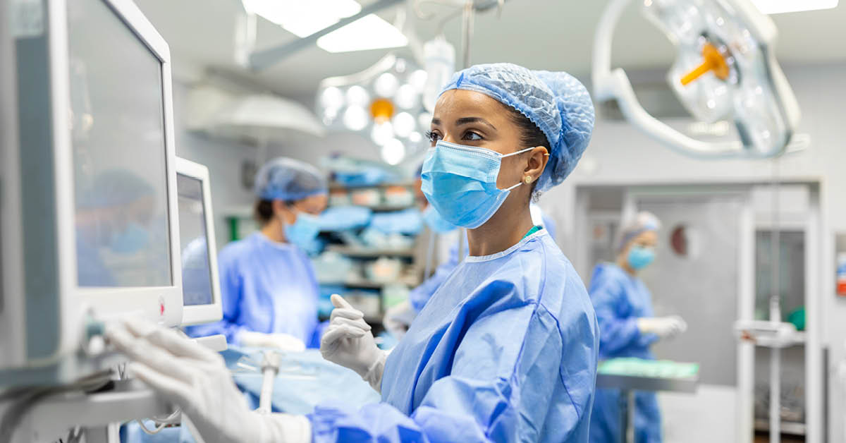 doctor performing robotic surgery